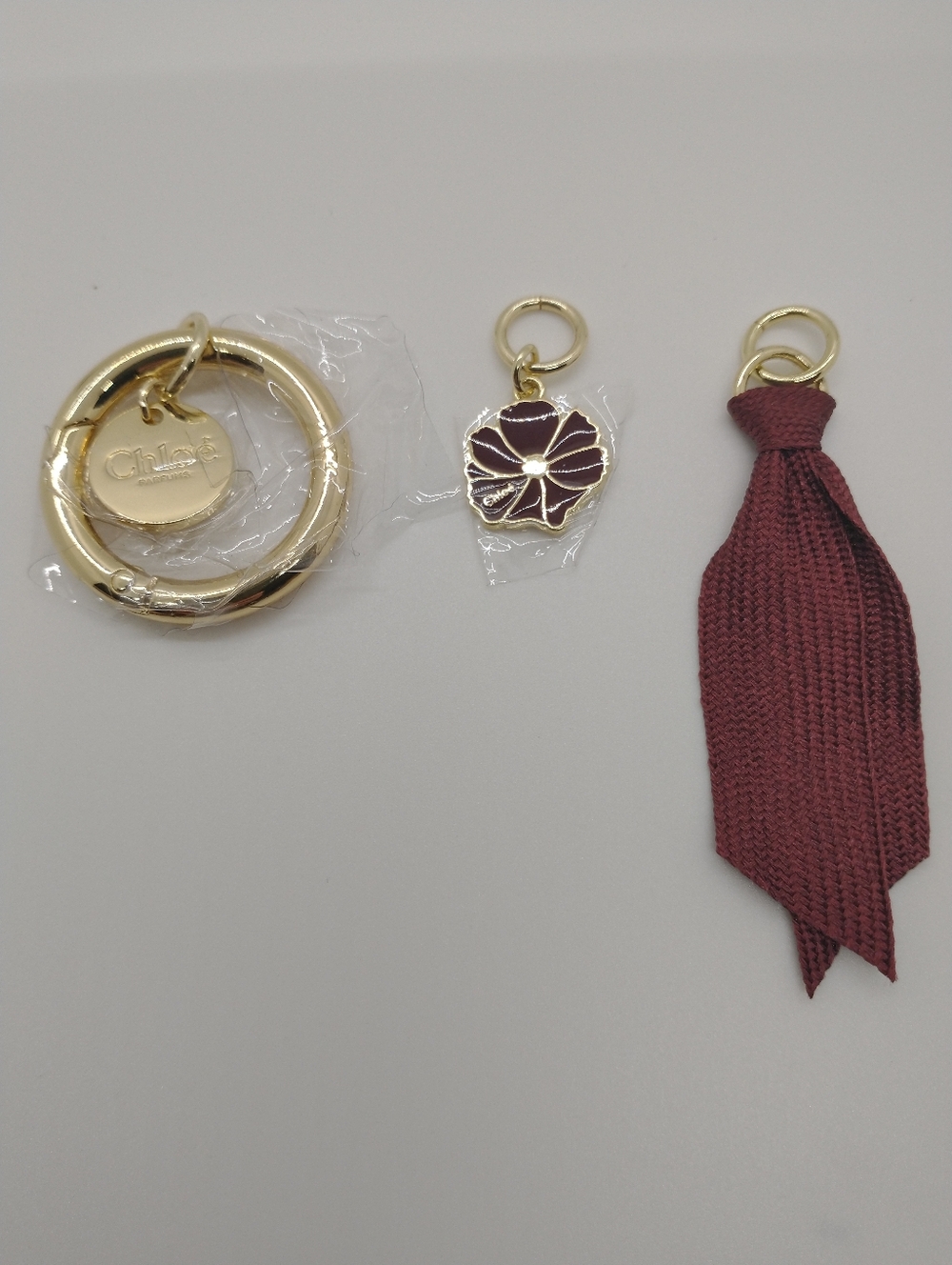 Chloé Parfum Purse Bag Charms Keychain Burgundy Ribbon Gold Color  Brand New